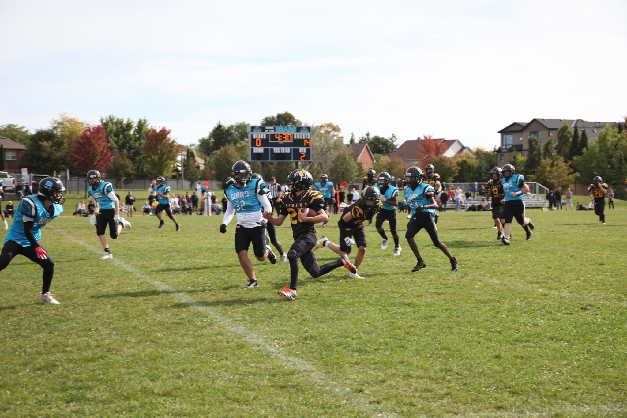 A Tigers ball carrier runs through traffic