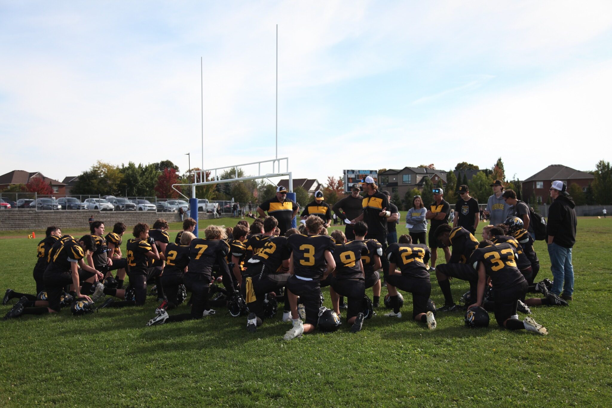The Tigers gather together after the Brooklin victory