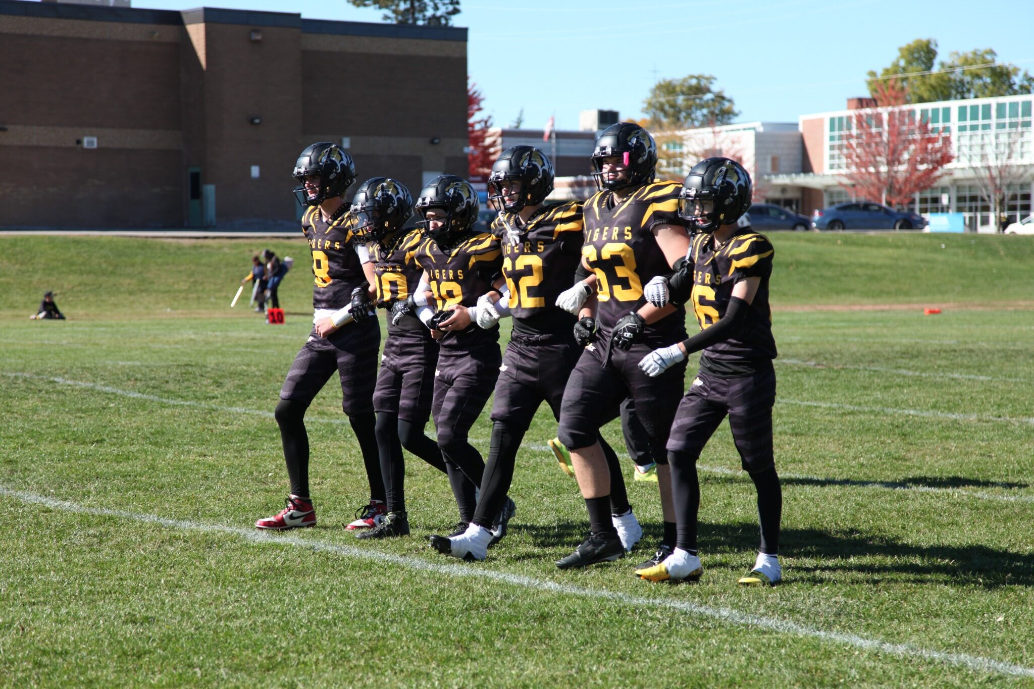 Uxbridge players take the field at Tigers Field