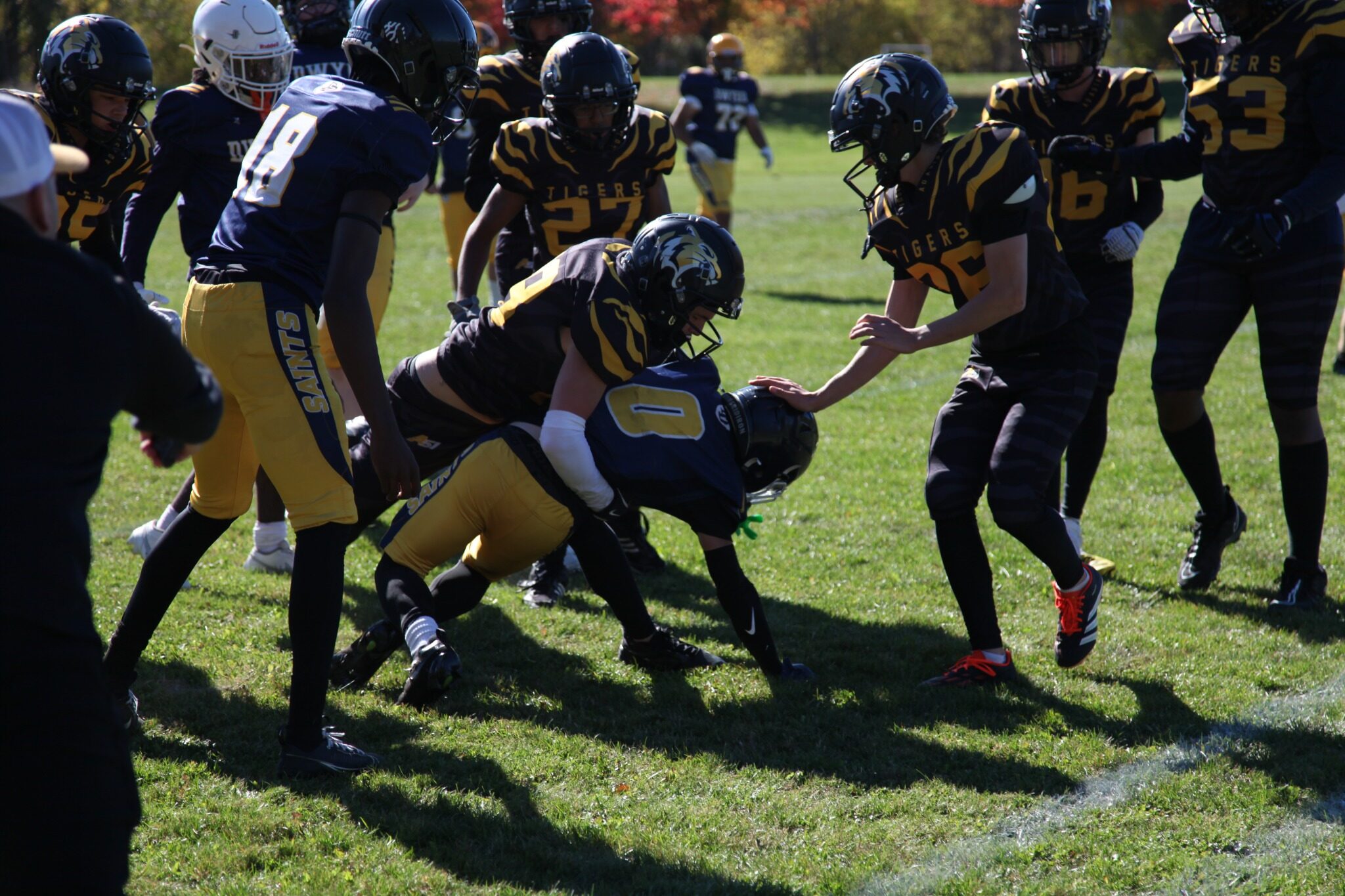 Uxbridge finishes a tackle against Dwyer