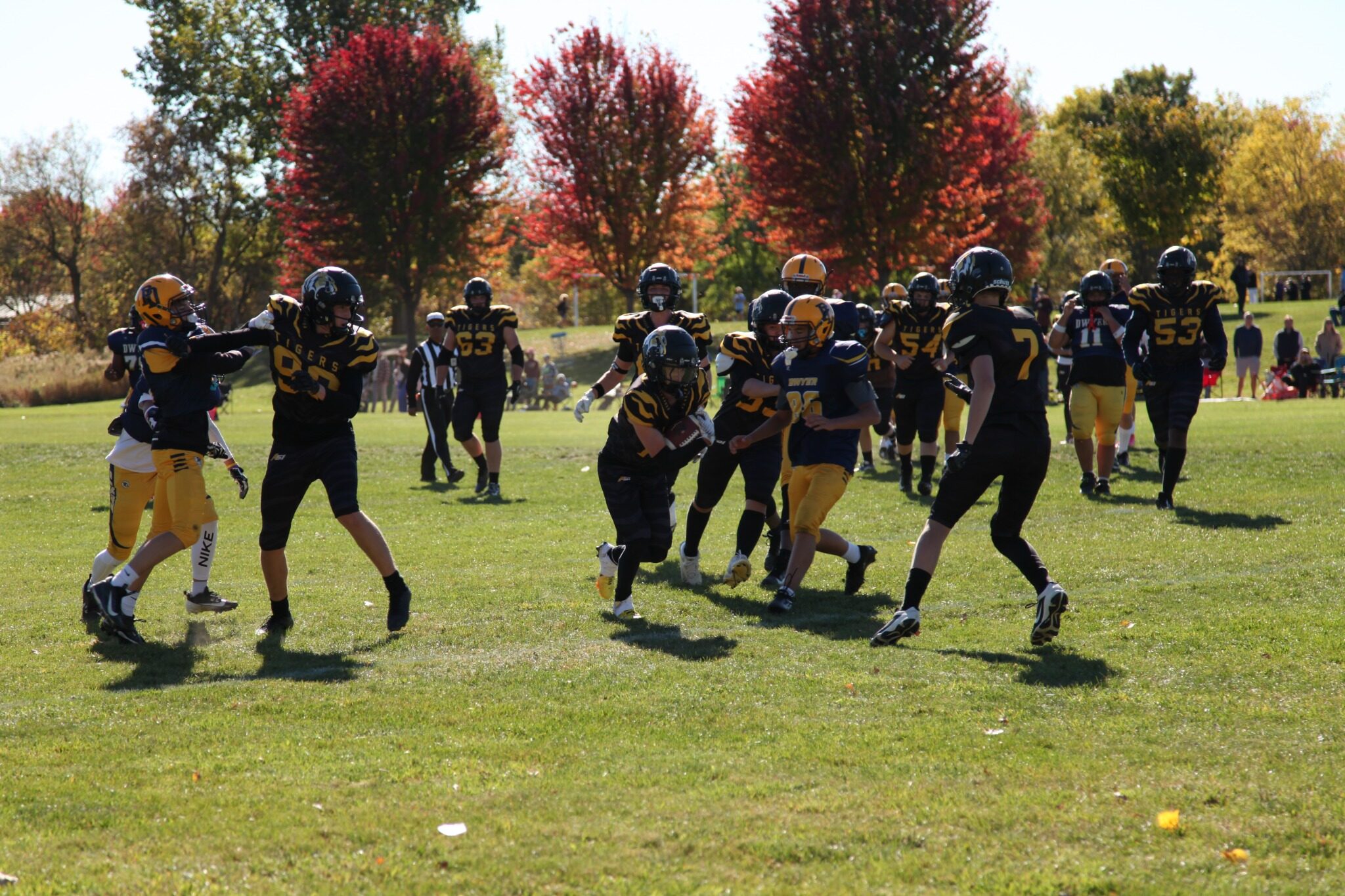 Tigers players regroup after a play