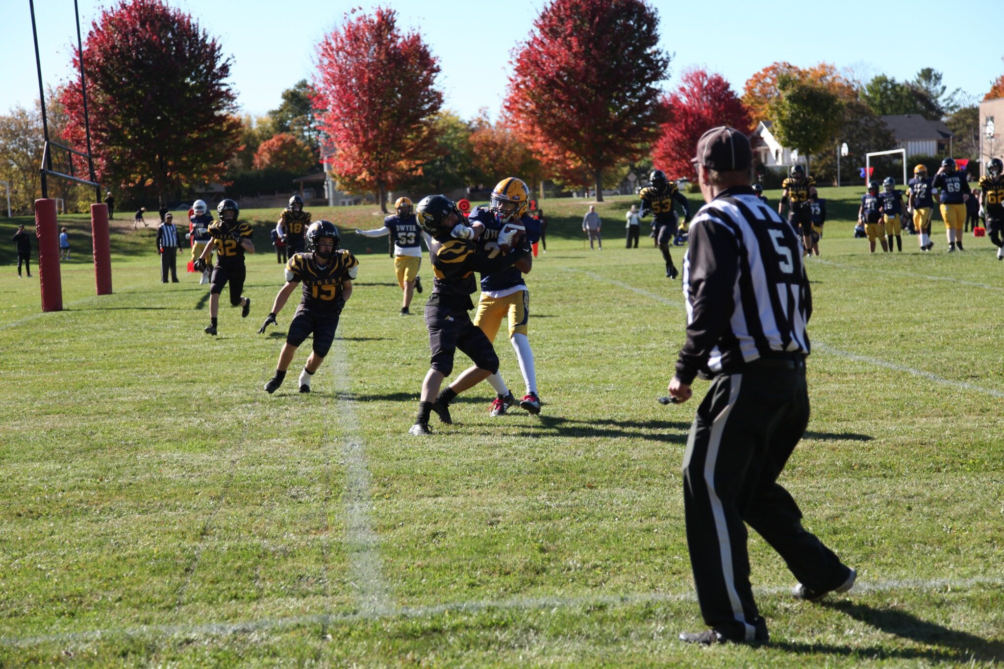 A Tigers player runs toward open field