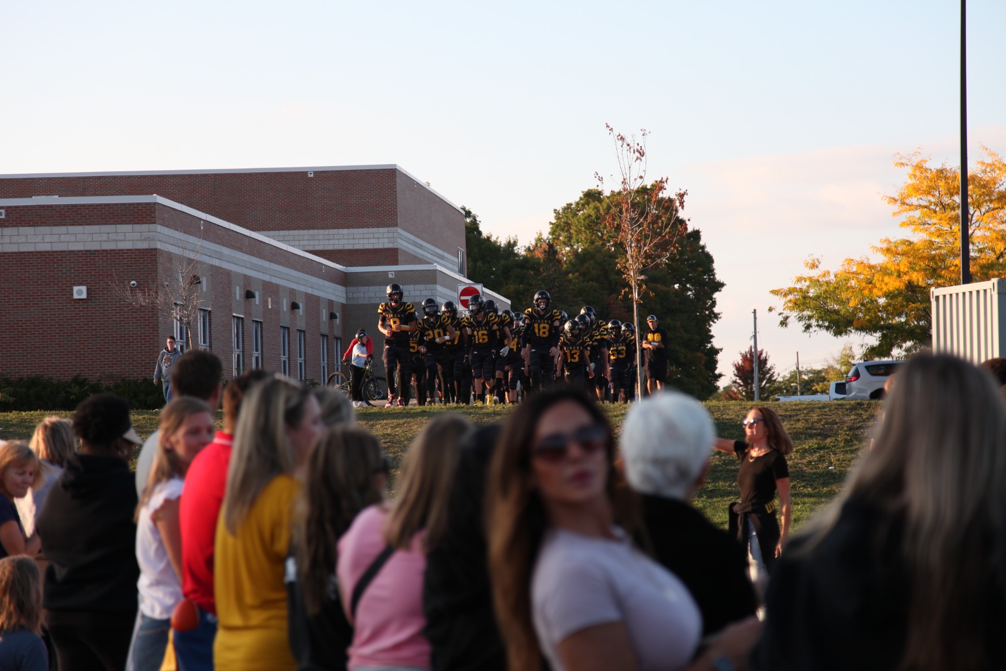 The Tigers make their Homecoming entrance through the crowd