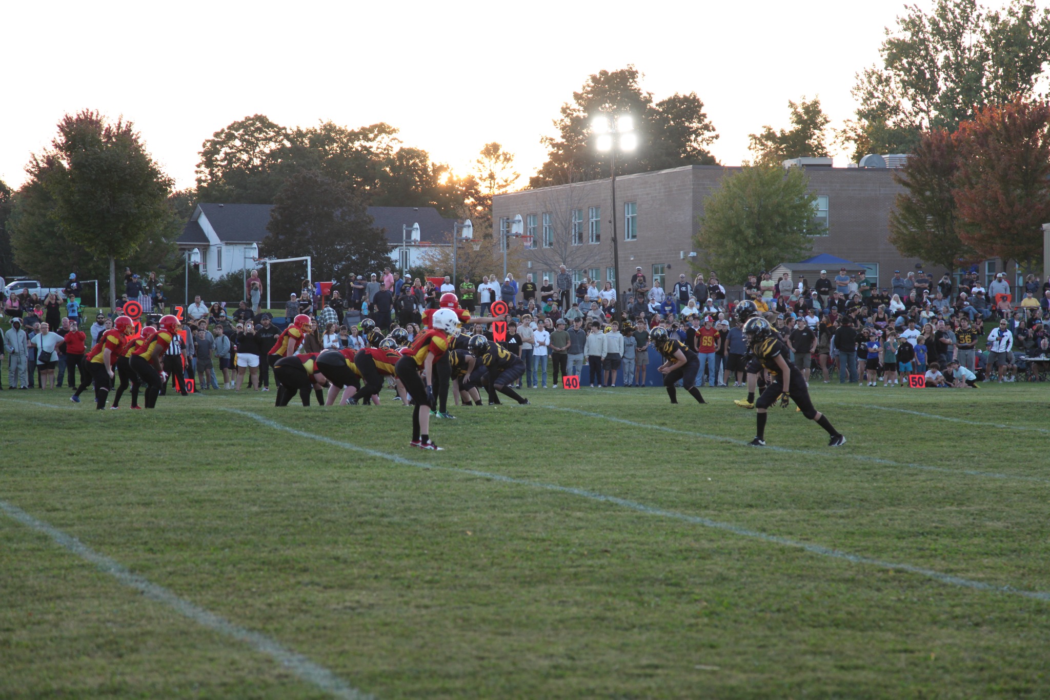 The Tigers offence lines up in front of a packed Homecoming crowd