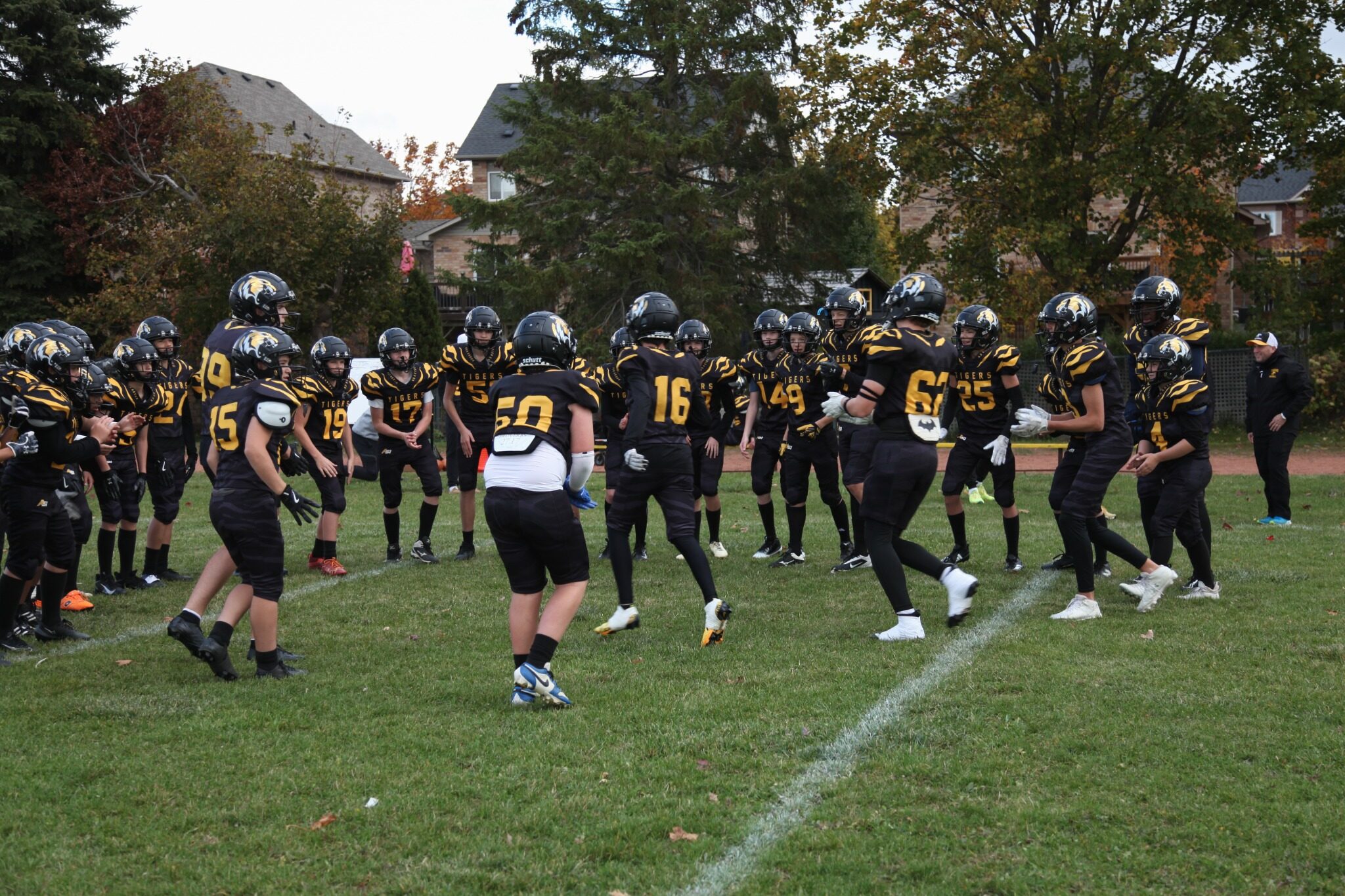 Uxbridge players take the field against O’Neill